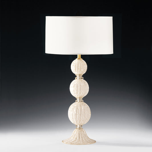 White Venetian glass lamp with white shade.