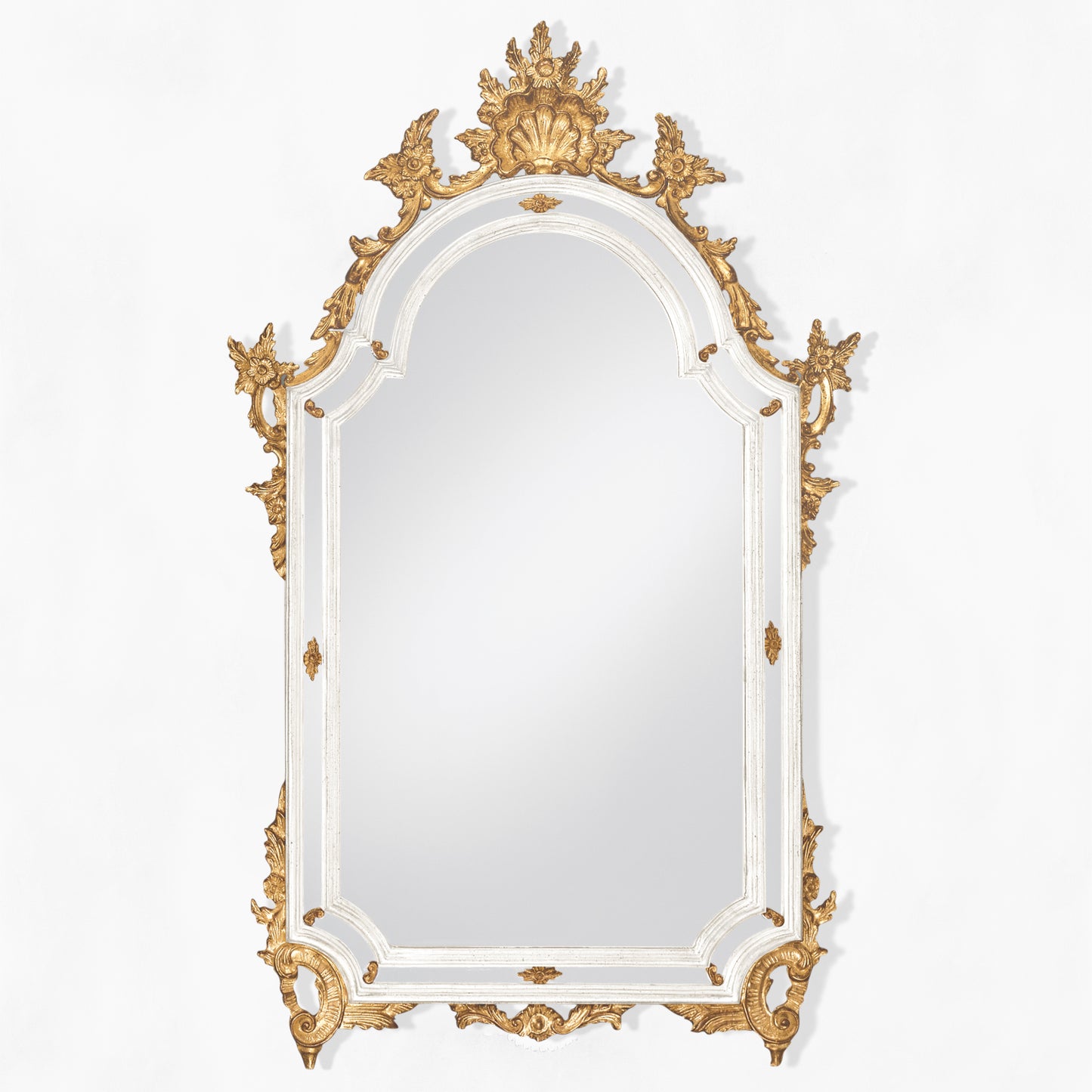 Ornate antique white and gold Italian mirror.