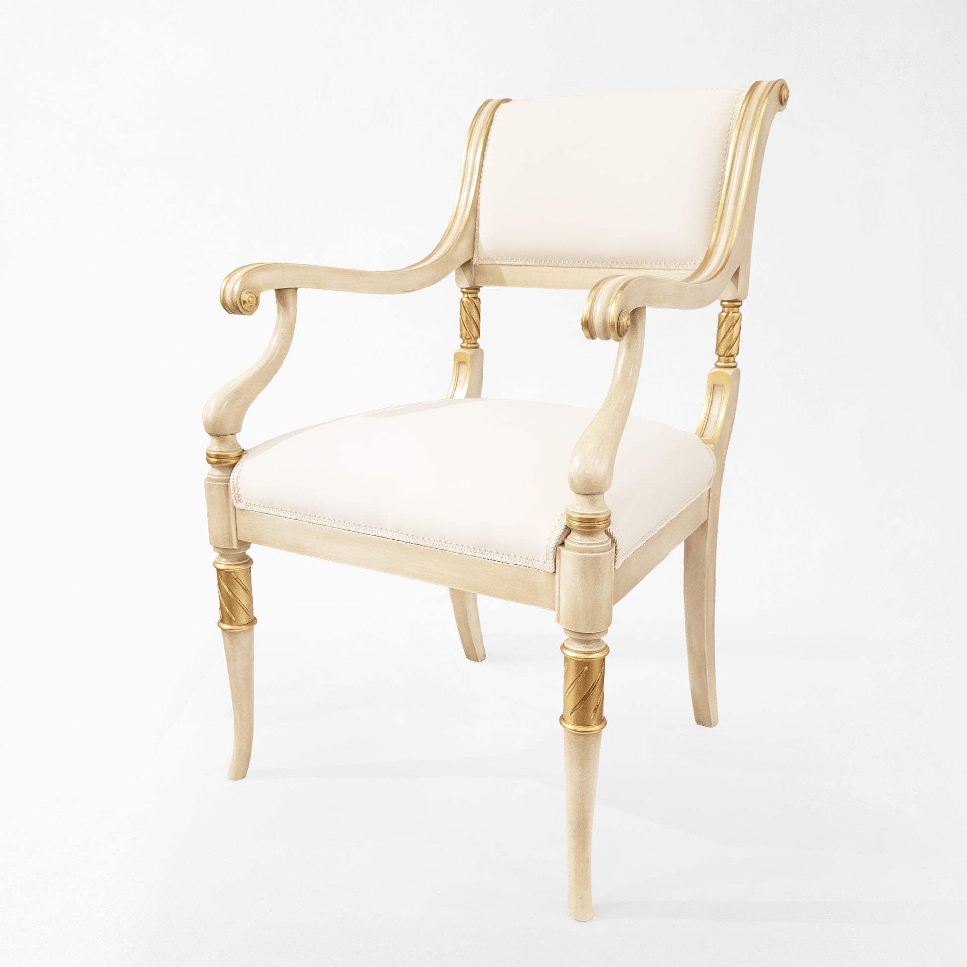 White and gold armchair.