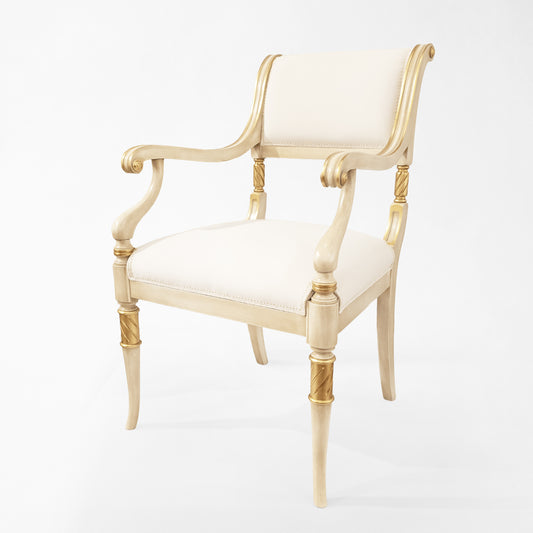 White and gold armchair.