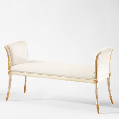 White and gold bench with white fabric.
