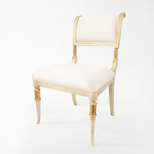 Antique white and gold side chair.