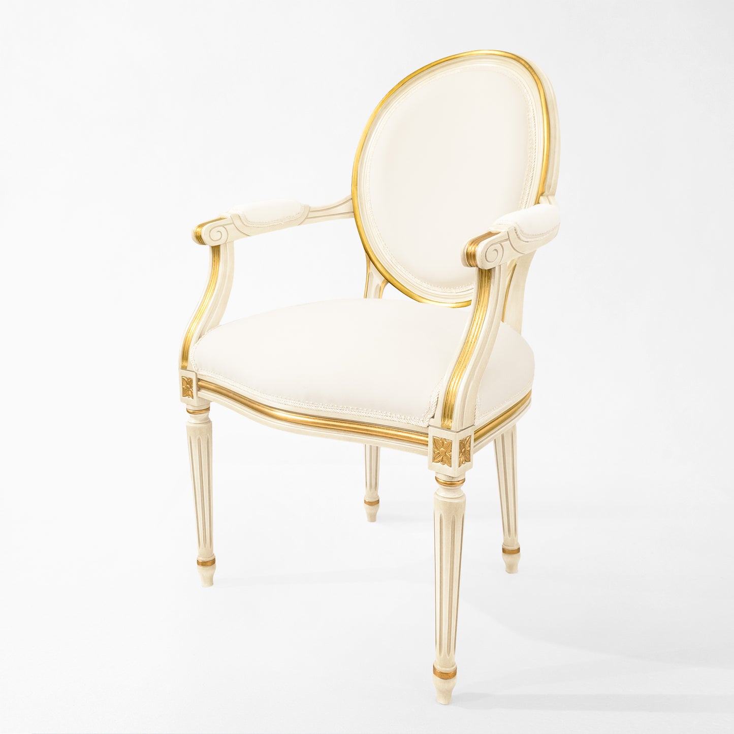 Round white and gold chair with white fabric.