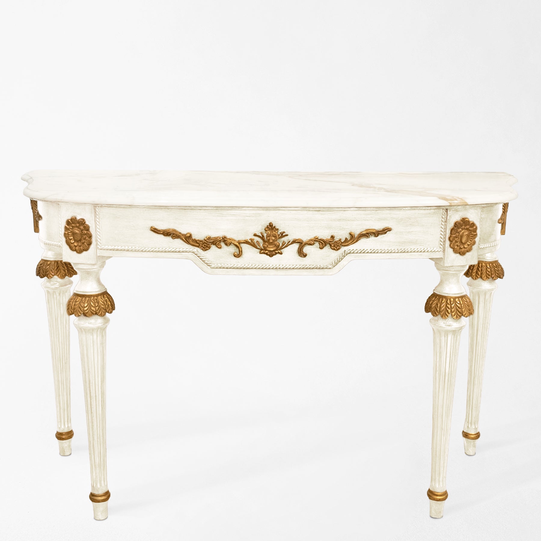 Ornate white console with gold details and white marble.