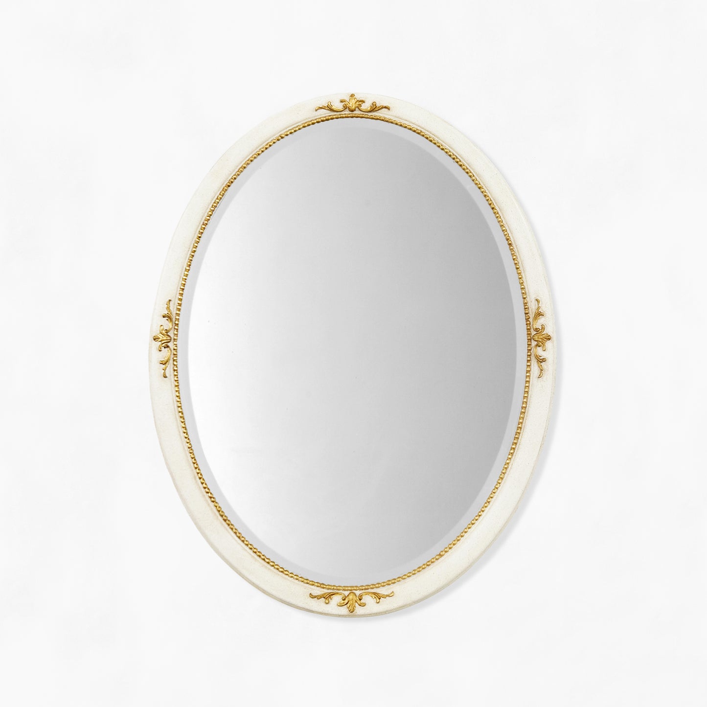 Traditional oval white mirror with gold details.