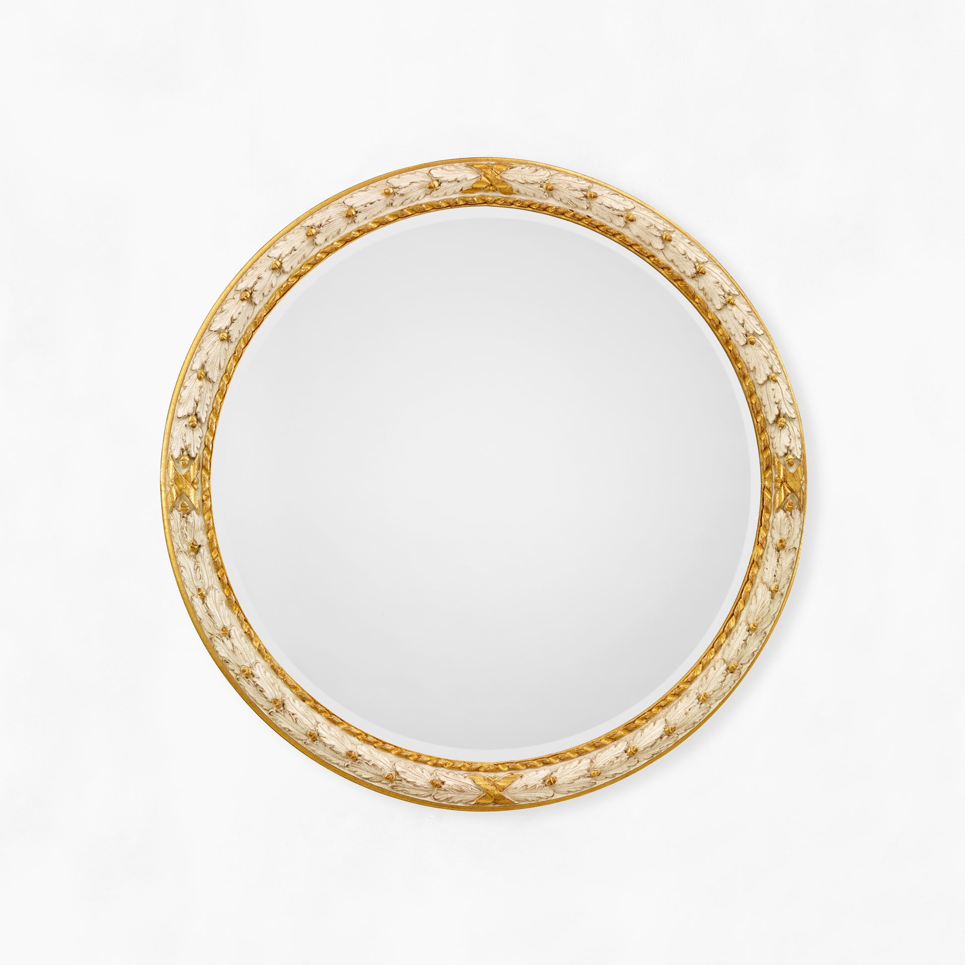 Antique white and gold round mirror.