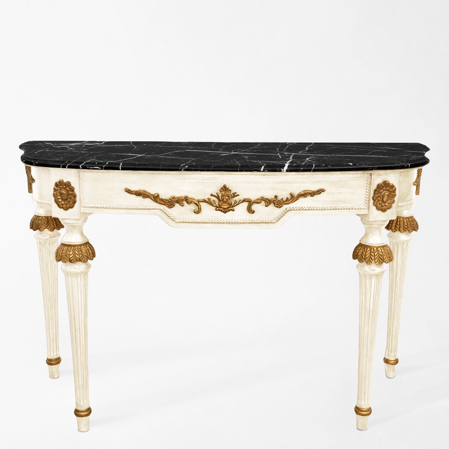 White Italian console table with black Nero Marquina marble top and carved gold details.