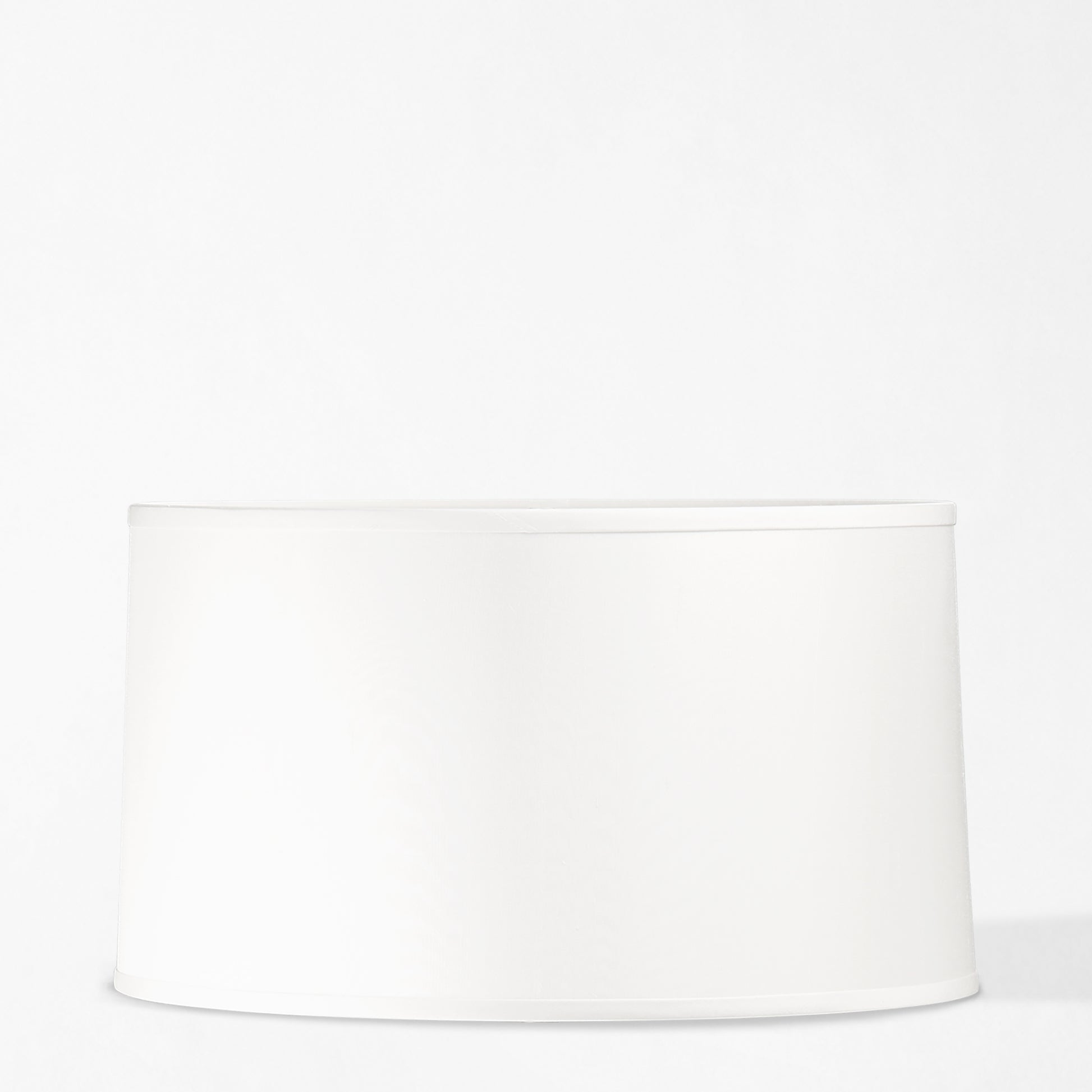 Tapered drum white linen lamp shade.