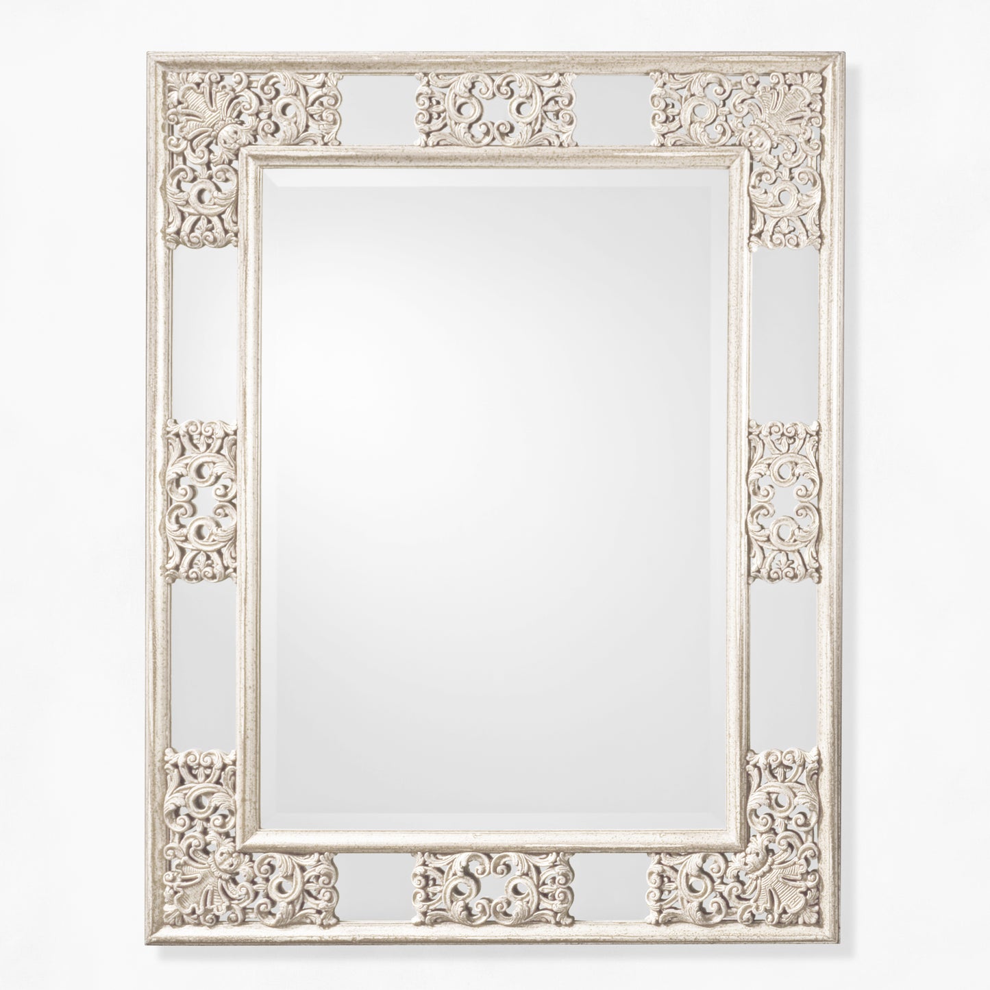 Antique white ornate mirror.
