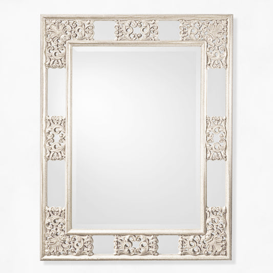 Antique white ornate mirror.