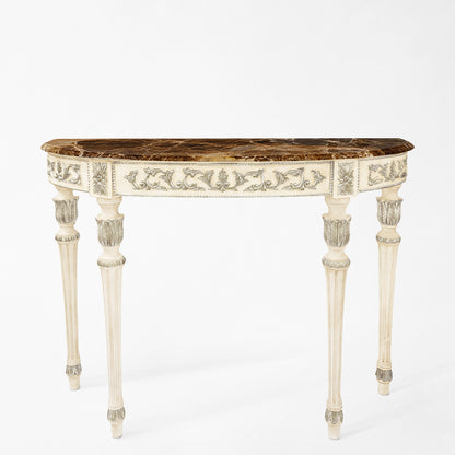 A white and silver Italian console table with a brown marble top.