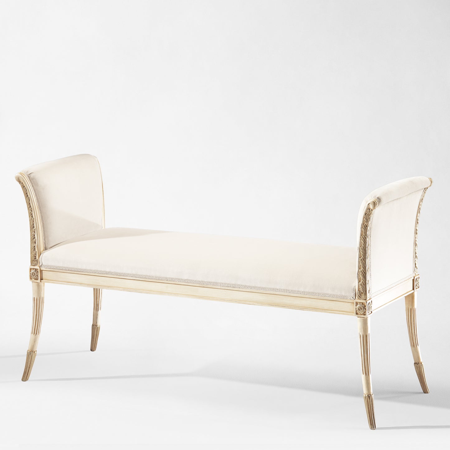 White and silver bench with white fabric.