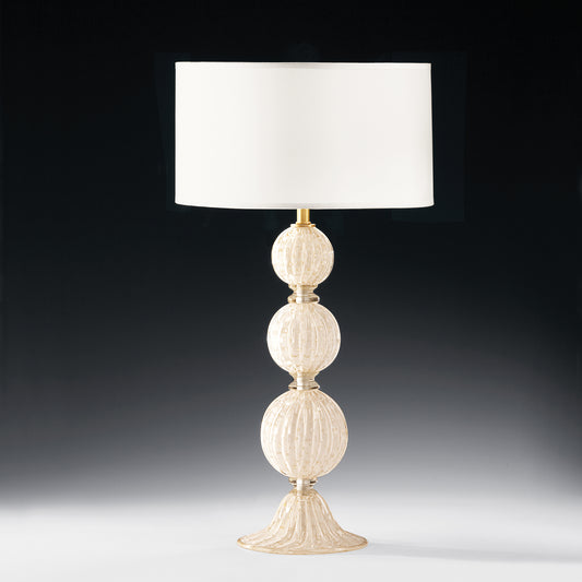 White and gold Venetian glass lamp with white shade.